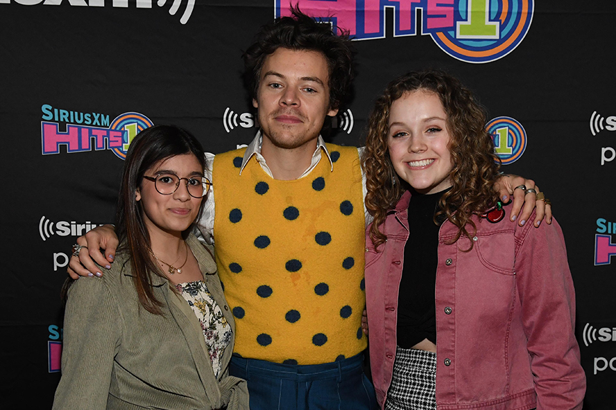 Harry Styles meeting with two fans