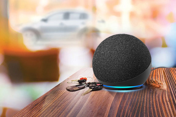 Amazon Dot sitting on wooden counter