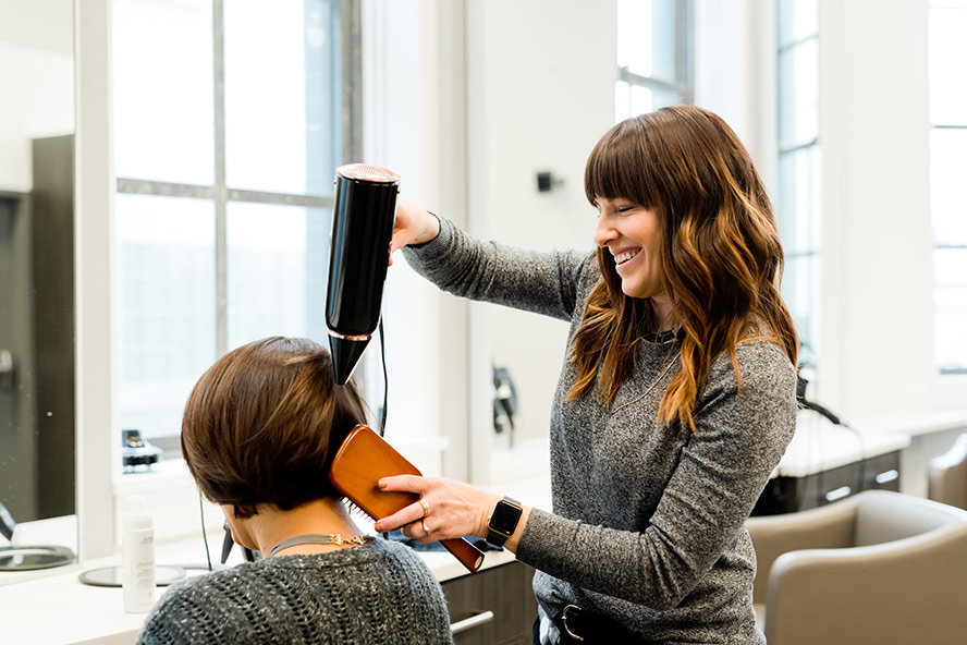 Hair Stylist working on hair