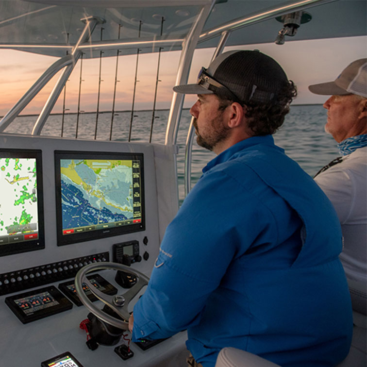 Two fishermen on a modern boat