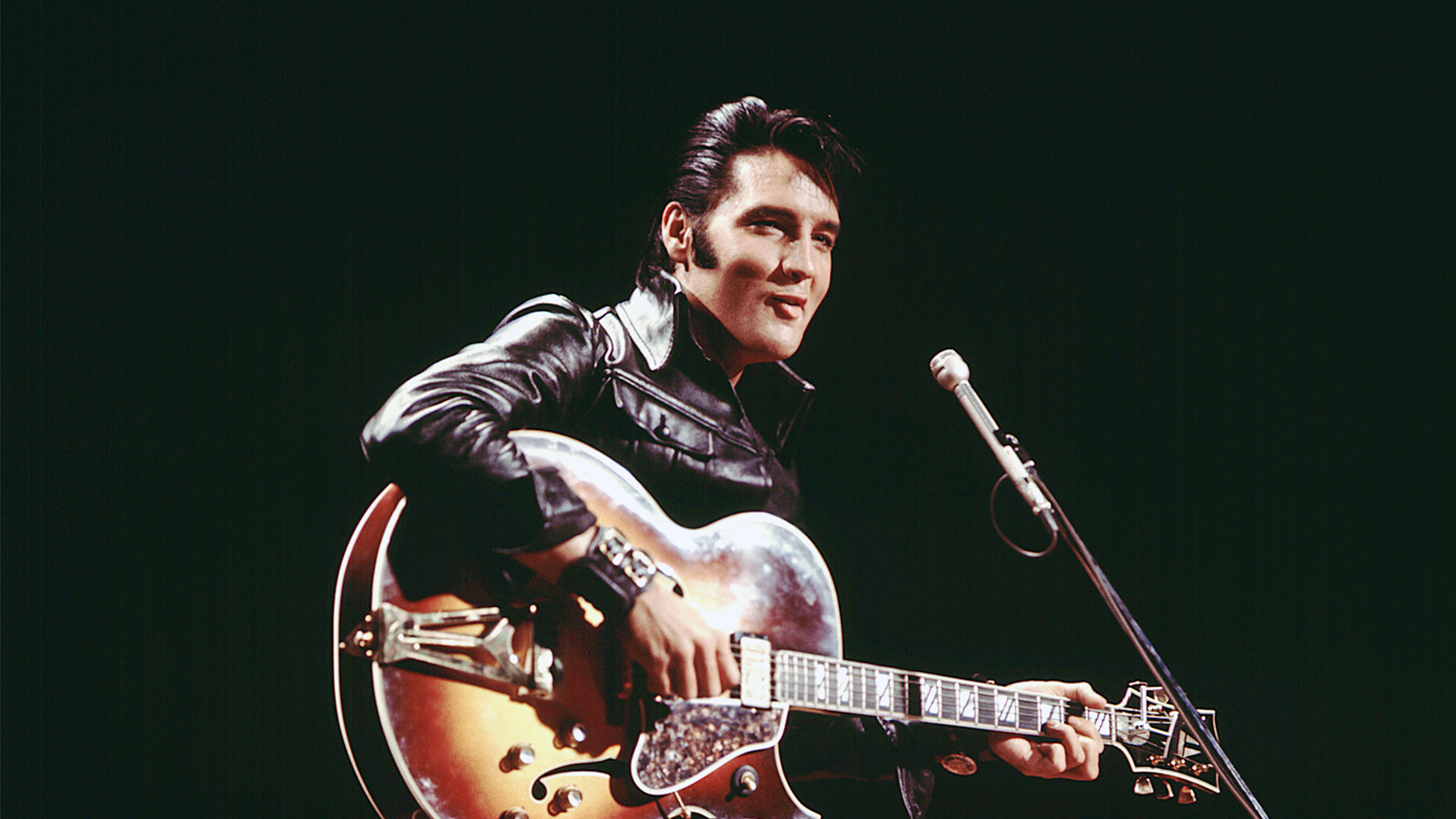 Elvis performing on stage