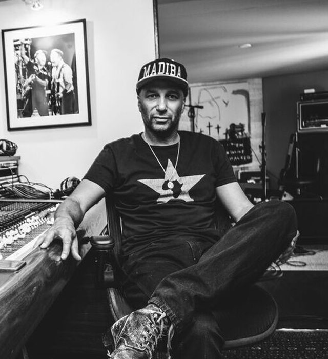 Tom Morello sitting in a recording studio